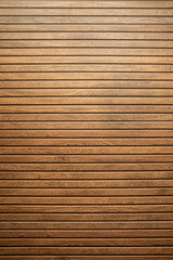 Decorative ceramic wooden wall with aligned planks and a natural brown color