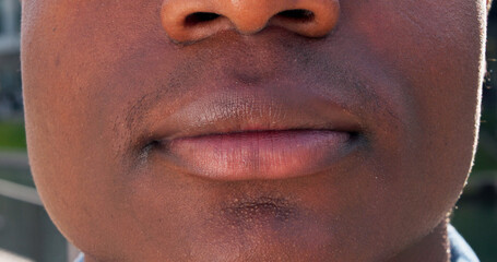 Closeup, mouth and man in city, skincare and confidence with smooth skin. Outdoor, person and guy...