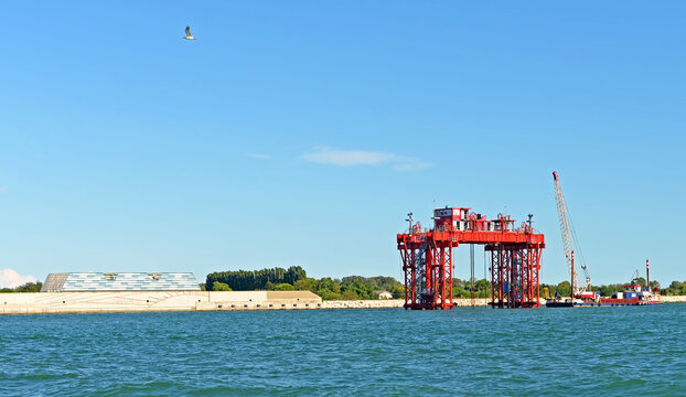 VENICE, ITALY &ndash; SEPTEMBER 10, 2024: Maintenance of the Mose System at Bocca di Porto di Lido. The mobile barriers protect Venice and its lagoon from high waters