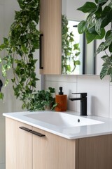 Fototapeta premium Modern Bathroom Vanity With Plants and Black Fixtures