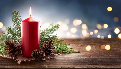 Christmas background - First Advent Sunday - Red Advent candle with natural Xmas decoration, branches and pine cones on rustic wood with magic lights