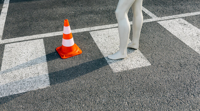 Pedestrian Crossing with Traffic Cone and Mannequin Legs