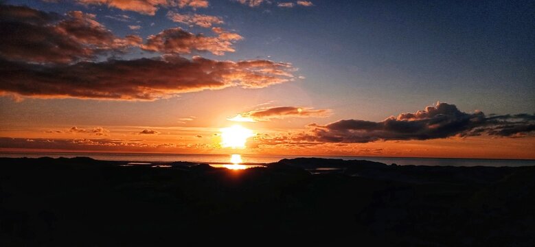 Abendstimmung an der K&uuml;ste von Amrum mit Blick Richtung Sylt