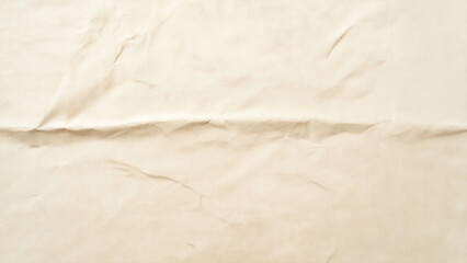 A close-up of a crumpled sheet of paper with aged, parchment-like edges, highlighting the texture and intricacy of its folds against a white background.
