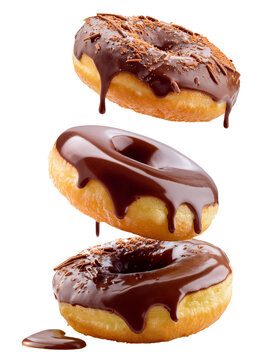 Three chocolate donuts falling on transparent background