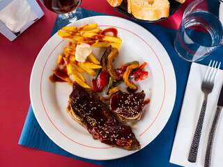 Delicious grilled Churasco beef steak with barbecue sauce and side dish