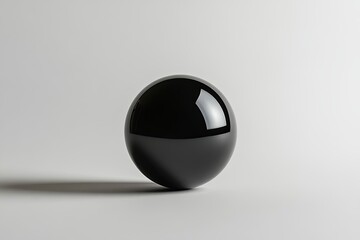 Round black sphere positioned on a smooth surface casting a subtle shadow in soft ambient light. Generative AI