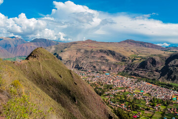 Urubamba village in Peru, Lares trek. Vegetation of the mountains in Peru. Peruvian dry soil and suculent plants growing on high altitude. Mountains of Peru landscape