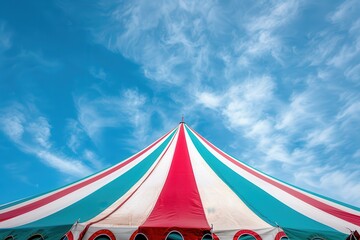 Colorful circus tent under blue sky