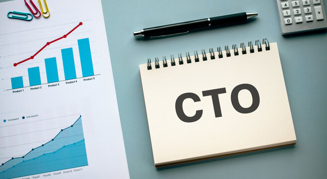There is notebook with the word CTO. It is an abbreviation for Chief Technology Officer as eye-catching image.