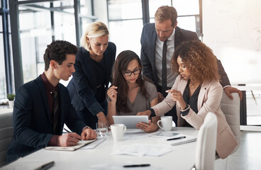 Group, business people and tablet in meeting with teamwork, collaboration or coworking in office. Women, men and technology for brainstorming, discussion or review in project management as colleagues