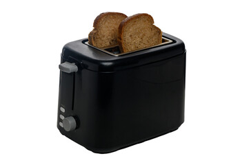Toasting delicious brown bread in a modern black toaster at breakfast time