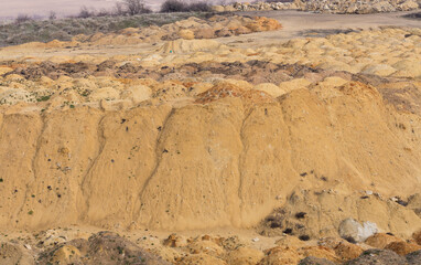 A large sand quarry. The place of sand extraction on an industrial scale.