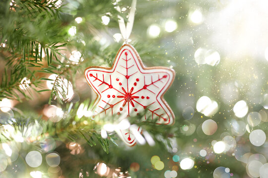 Decorative Star-Shaped Christmas Ornament.Star Snowflake Ornament on Christmas Tree.Decorative Star Ornament on Christmas Tree.