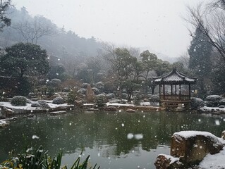 Fototapeta premium Snowfall over a serene Asian garden pond and gazebo.