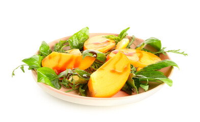 Plate of delicious salad with persimmon and lemon on white background