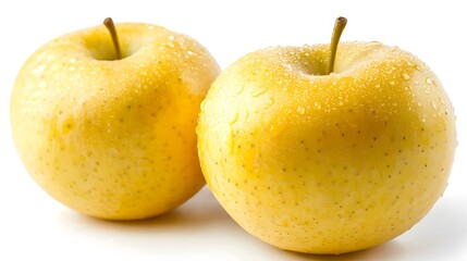 Two Golden Apples Covered In Water Droplets