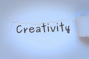 creativity word on paper