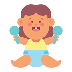 baby girl playing with rattle toy