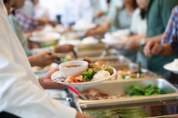 people group catering buffet food indoor, with food and beverage,Eat together.
