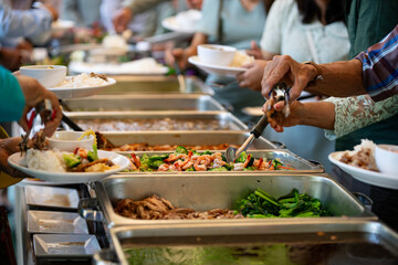 people group catering buffet food indoor, with food and beverage,Eat together.	
