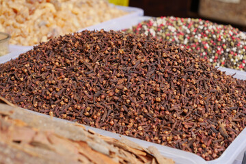 Fragrant and Dried Cloves on Display in a Lively Spice Market