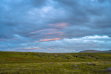 Sunrise with clouds on the coast of the Langanes peninsula in Iceland