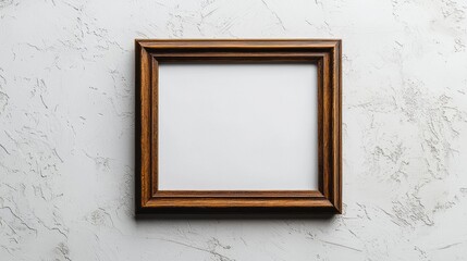 An unadorned wooden frame rests against a softly textured white wall, patiently awaiting a special image. Its elegant design suggests a story untold, ready to showcase treasured memories