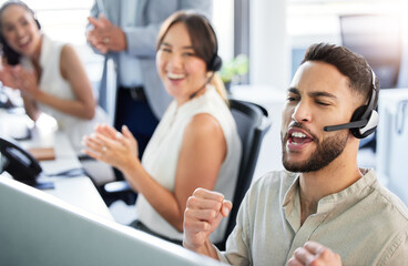 Man, telemarketing and excited with fist on computer for reaching target, bonus and deadline....