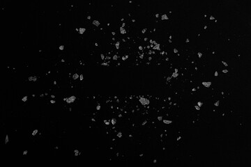 Ice, snow, broken ice, glass, granules, texture, texture, material, black background, overlay, color, broken glass, splash, explosion, graphics, beverage, soda, cola, juice, liquor, cocktail.