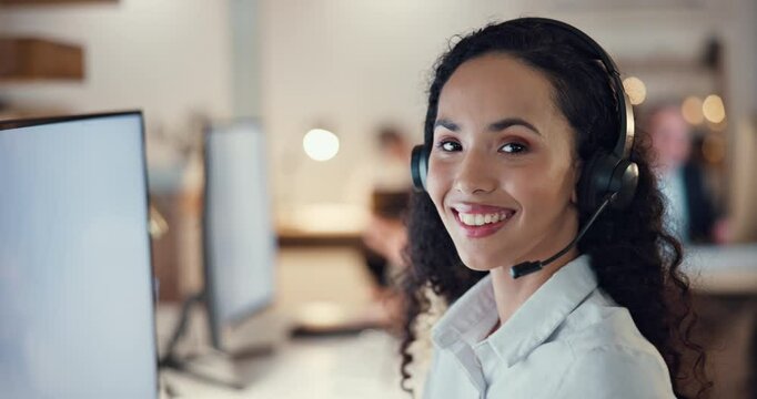 Woman, face and smile in call center for consulting, lead generation and contact at computer. Agent, headset and happy in agency for customer service, technical support or assistance at help desk