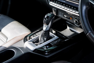 automatic transmission shift selector in the car interior. Closeup a manual shift of modern car...
