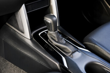 automatic transmission shift selector in the car interior. Closeup a manual shift of modern car...