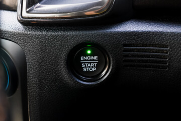 Close up engine car start button. Start stop engine modern new car button,Makes it easy to turn...