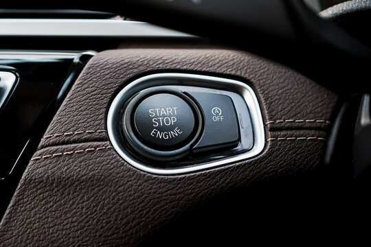 Close up engine car start button. Start stop engine modern new car button,Makes it easy to turn your auto mobile on and off. a key fob unique ,selective focus