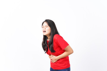 Hand on Stomach suffering Stomachache, Pain on Stomach Of Beautiful Asian Woman wearing red shirt Isolated On White Background