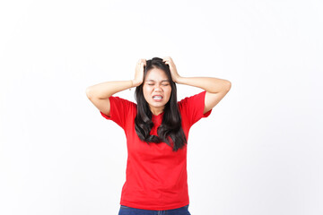 Hand on Head suffering headache, Pain on head Of Beautiful Asian Woman wearing red shirt Isolated...