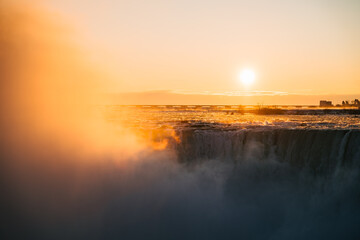 sunrise over a waterfall