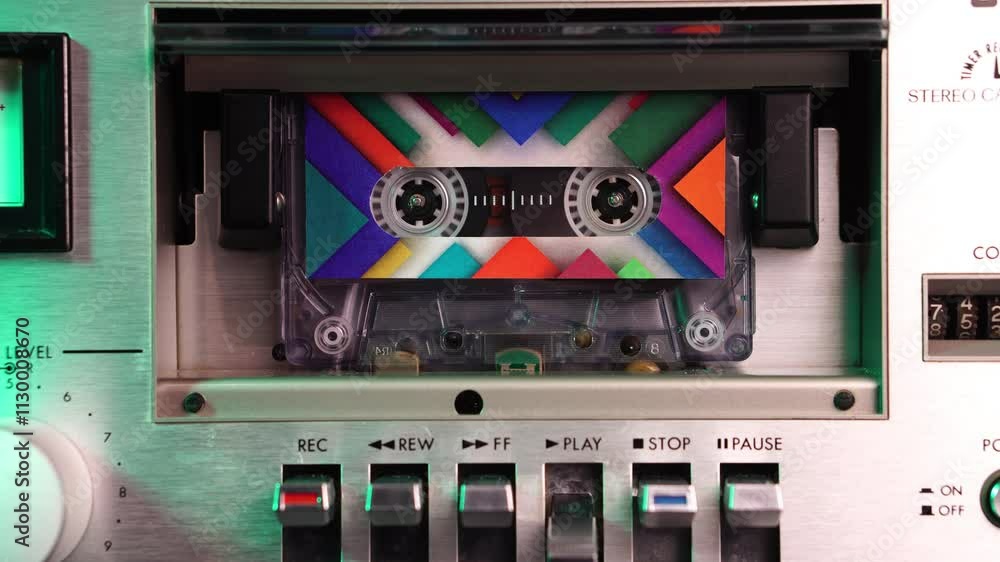 Poster audio cassette tape collage slideshow, different colorful label patterns, playback close up loopable
