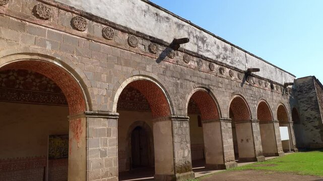 Entrance of the atrium of the Temple and ex-monastery of the Divino Salvador and stone cross in the town of Malinalco, State of Mexico, Mexico.  4K Video