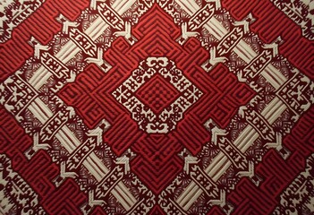 Texture background pattern. Woolen fabric Bright red color With rose flowers, this is the design and creation of art objects for interior design such as designer ornaments, wallpapers and other items
