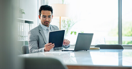 Tablet, research and reading with business man in office for planning, finance and company budget....