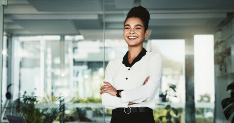 Portrait, arms folded and happy business woman in office for pride, career and policy development...