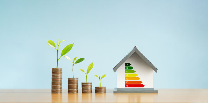 Energy-saving homes, energy efficiency concepts, eco-friendly home improvements, cost savings, low-energy eco-friendly homes, green handshake.