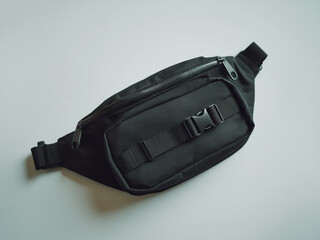 Fototapeta premium Black blank Fanny pack mockup.Eco friendly stylish trendy Waist pack Zippered Fanny Pack laying flat