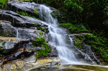 Fototapeta premium Montha Than Waterfall Or San Pa Yang Waterfall in Rainy Season at Doi Suthep - Pui National Park, Chiangmai Northern Thailand.