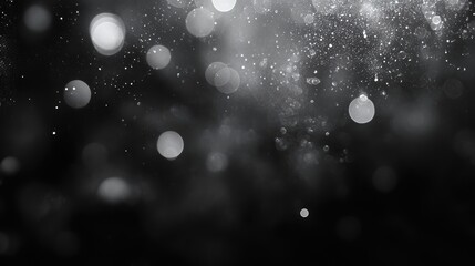 Abstract black and white bokeh light background with shimmering circles and soft focus for creative designs and artistic presentations