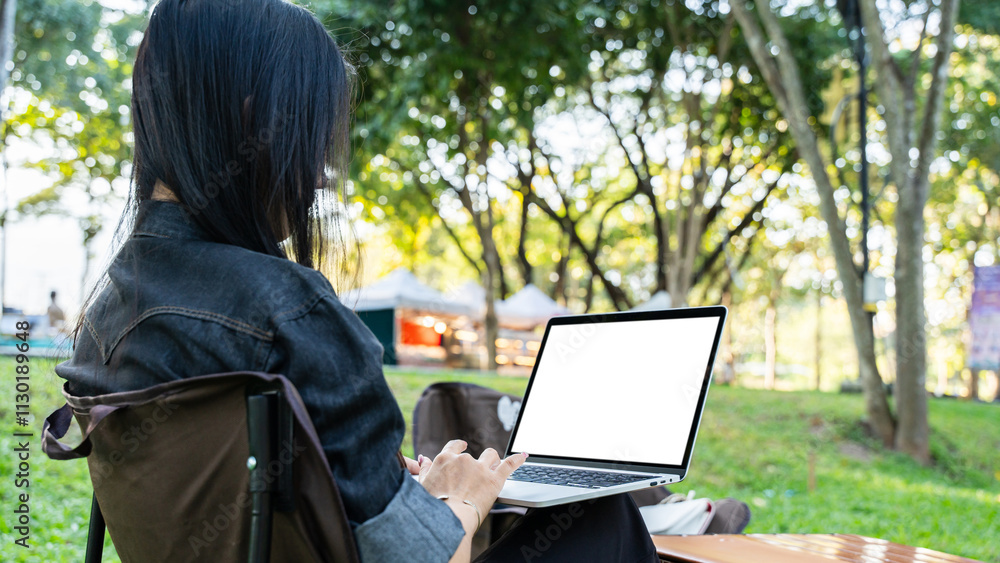 Canvas Prints freelancer working with laptop with empty white screen on sunny day