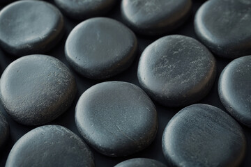 rounded black pebbles with a matte finish