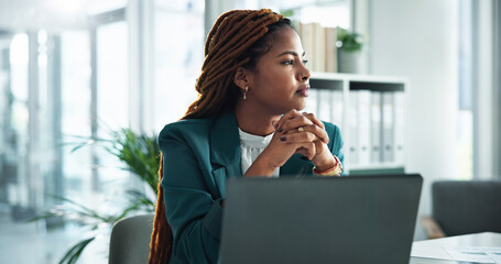Thinking, laptop and lawyer with business woman in office for research, reflection and legal clerk. Planning, litigation and corporate attorney with African person in law firm for memory and review